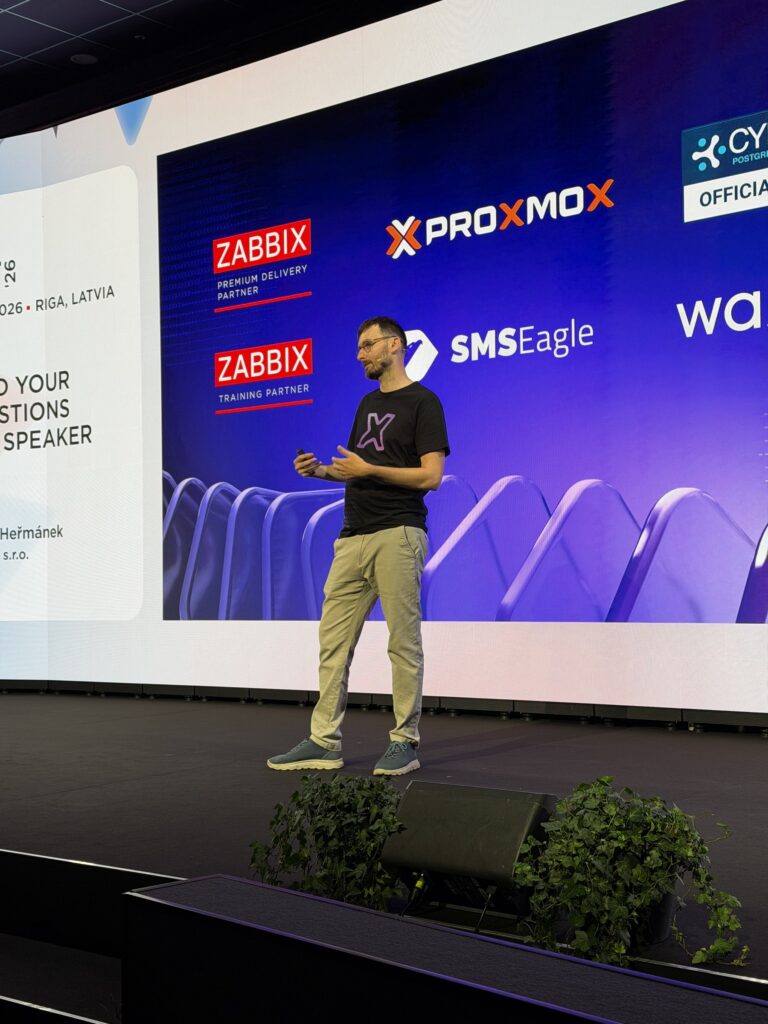 Prezentace initMAX na hlavním pódiu – Zabbix Summit 2026, Riga