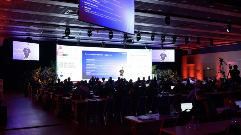 Konferenční sál během přednášky initMAX – Zabbix Summit 2026, Riga